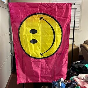 Vibrant Pink Flag with Yellow Smiley Face